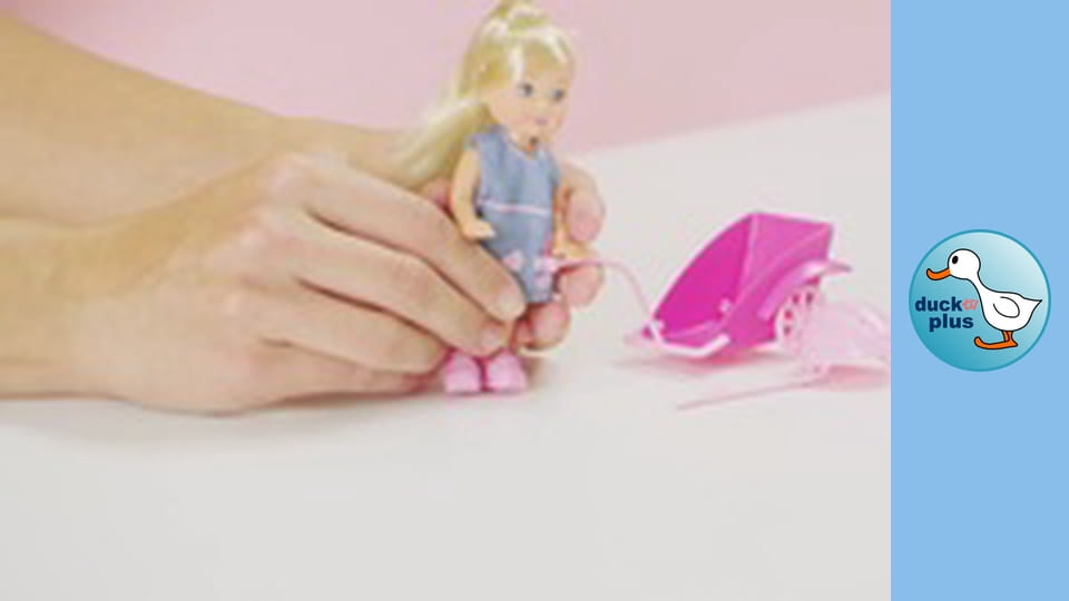 The World of Toys - Girl riding a bike